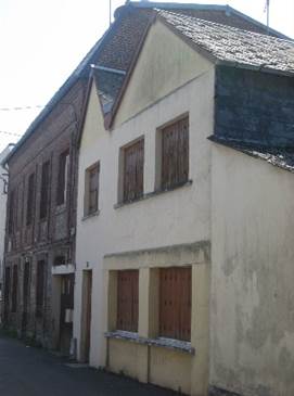 A building with many windows

Description automatically generated